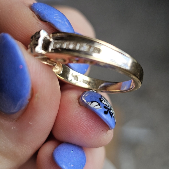 10k diamond ring size 7. Resizeable by a jeweler. Stamped 10k. Genuine diamonds. - Picture 7 of 12